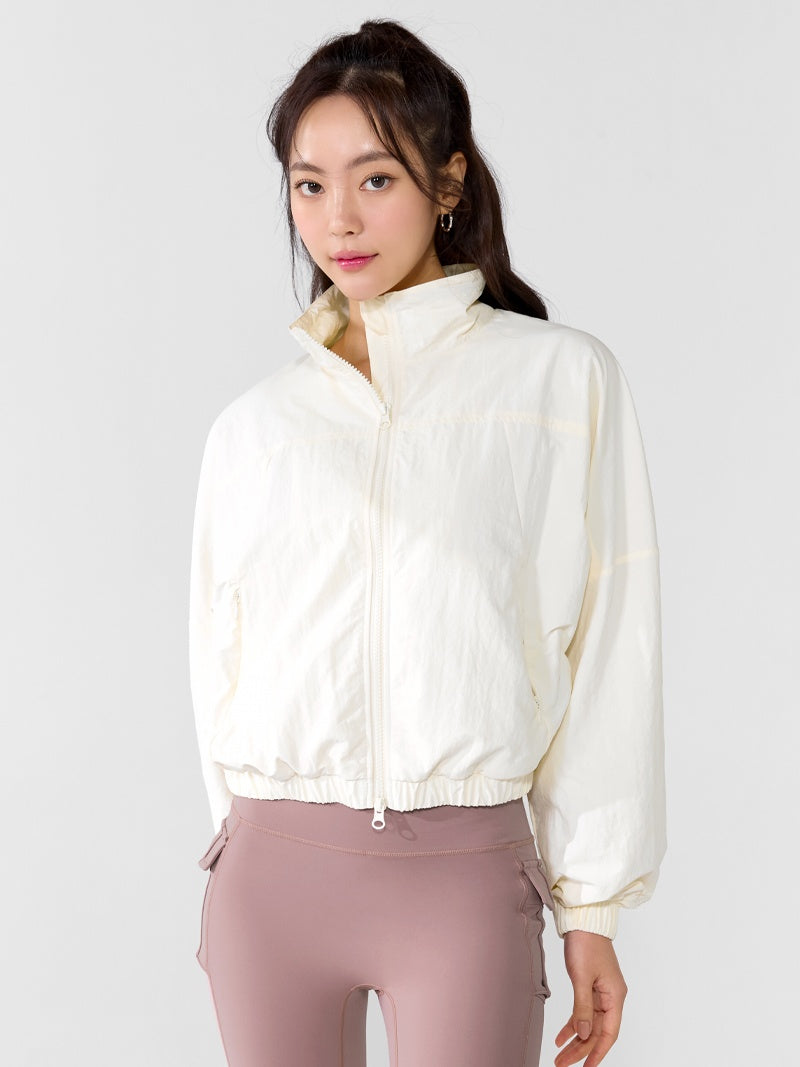 XTFJK08H4 ハイネック ドルマンスリーブ クロップド丈 ウィンドブレーカー