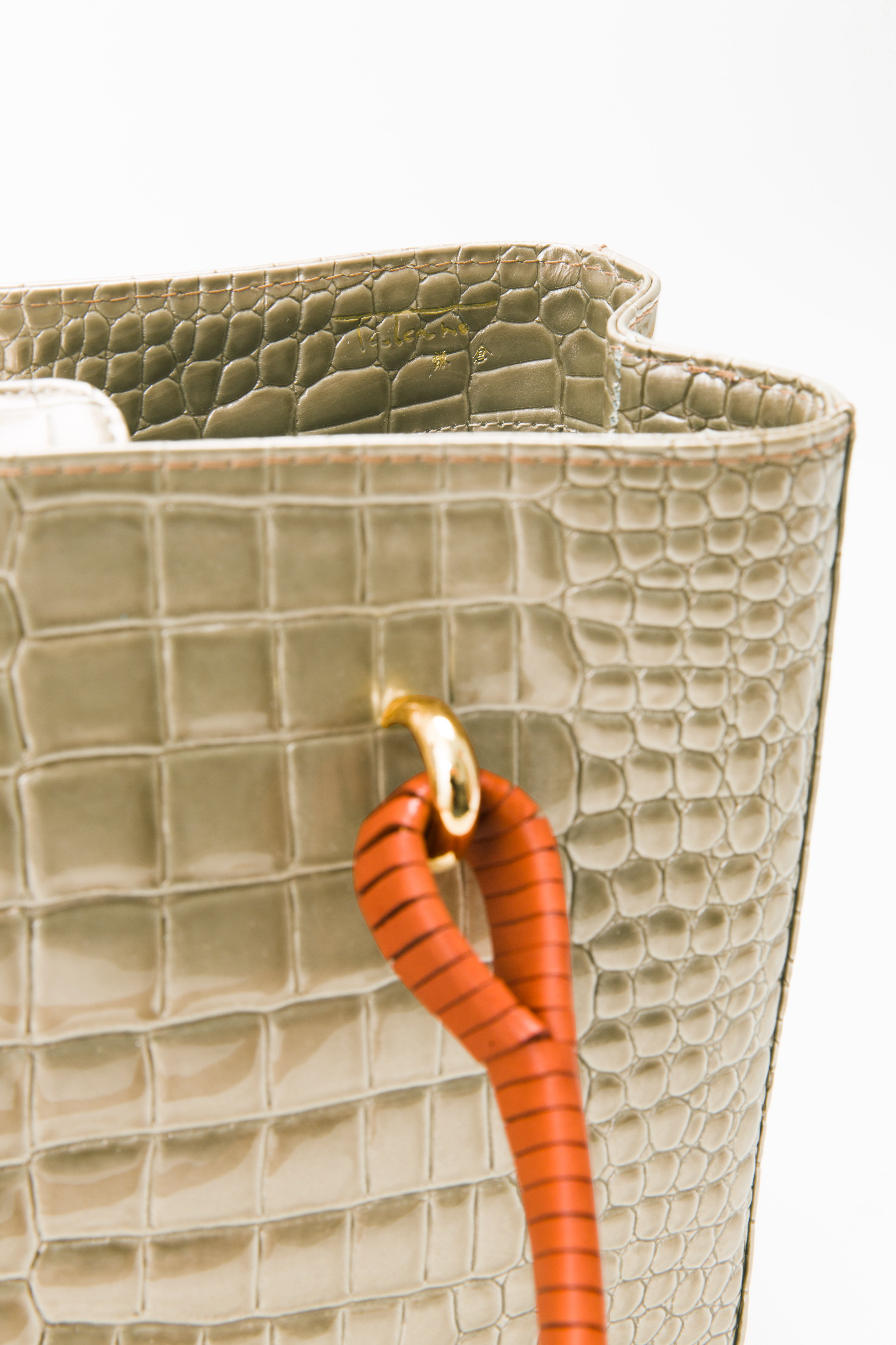 巻き手バッグ エナメル シャンパンゴールド ｜ 鎌倉のバッグ 鎌倉高野