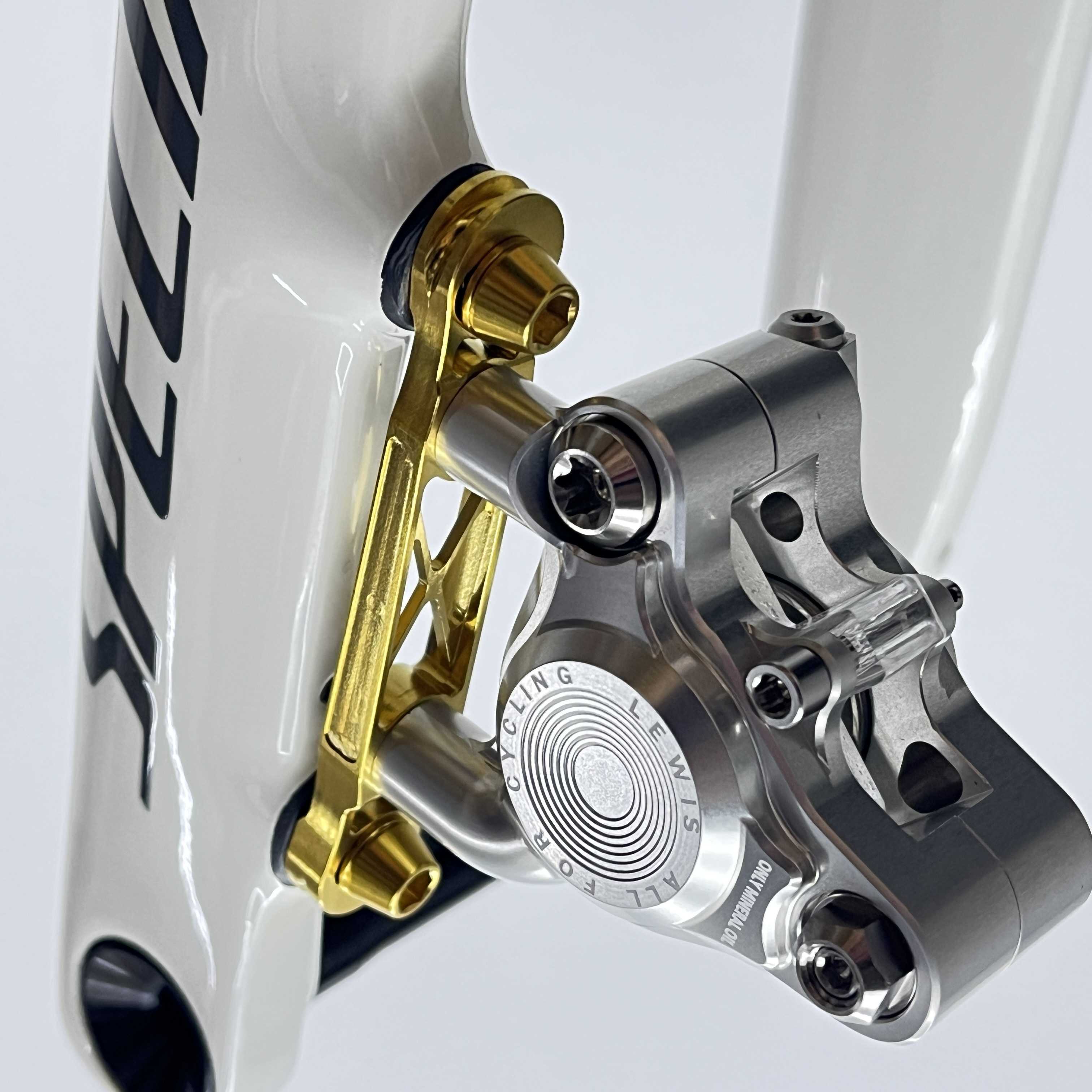 TiParts_front_caliper_adapter_