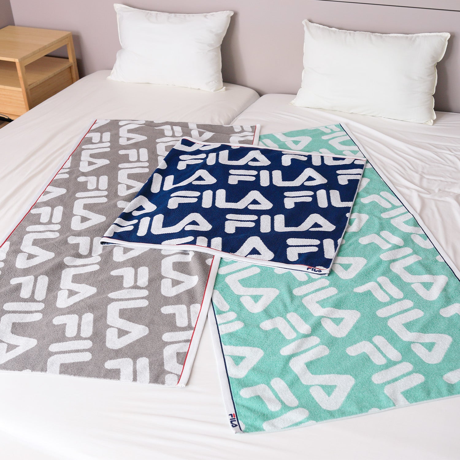 FILA』総柄 ボディタオル – タオル美術館公式オンラインショップ