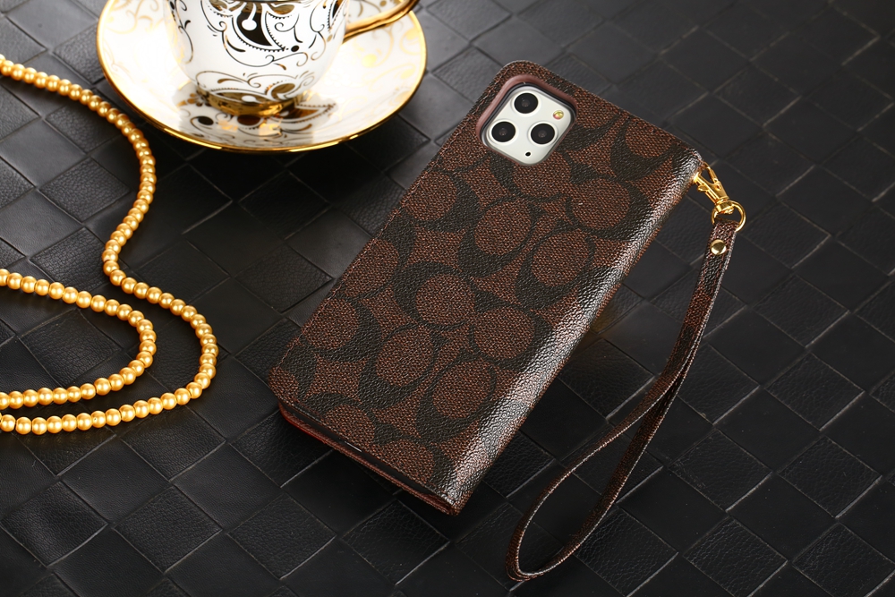 コーチ iPhone15/14/13 ProMax/13 Pro/13ケース シグネチャー柄 手帳型