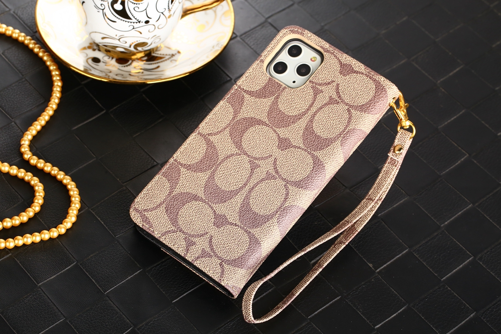 コーチ iPhone15/14/13 ProMax/13 Pro/13ケース シグネチャー柄 手帳型