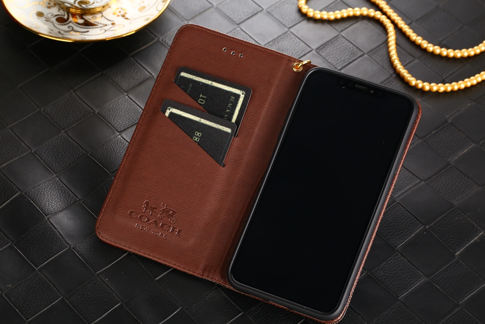 コーチ iPhone15/14/13 ProMax/13 Pro/13ケース シグネチャー柄 手帳型