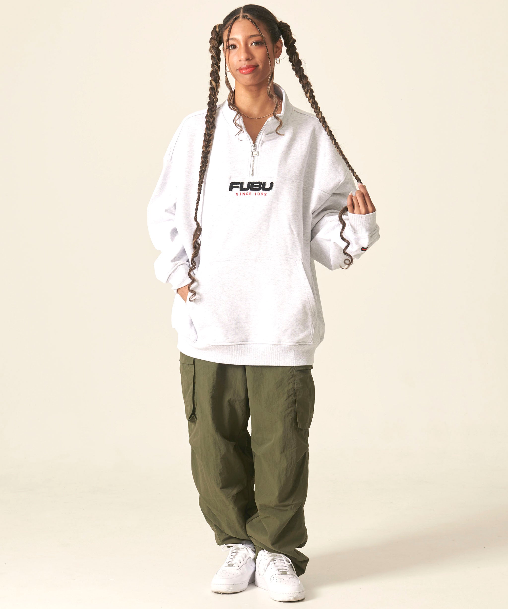 FUBU フブ トップス 裏毛 ハーフジップ スウェット。FUBUはアメリカの