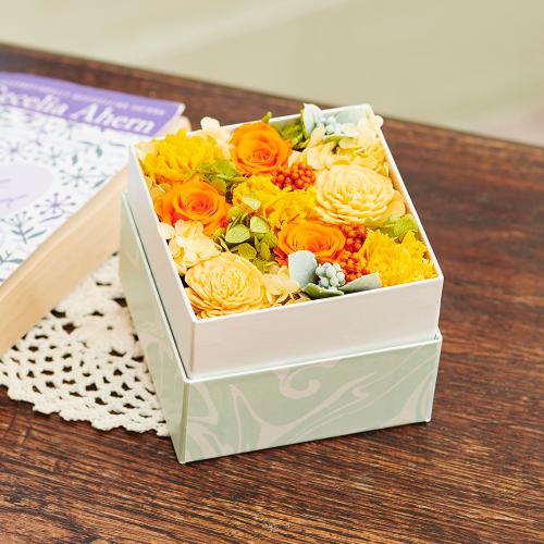 プリザーブドフラワーBOX(イエローオレンジ)」| 花屋「フジテレビ