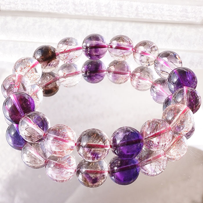 0847  石 カラーストーン パワーストーン 詳細不明 約7ミリ サンストーン ストレートブレスレット パワーストーン 日長石