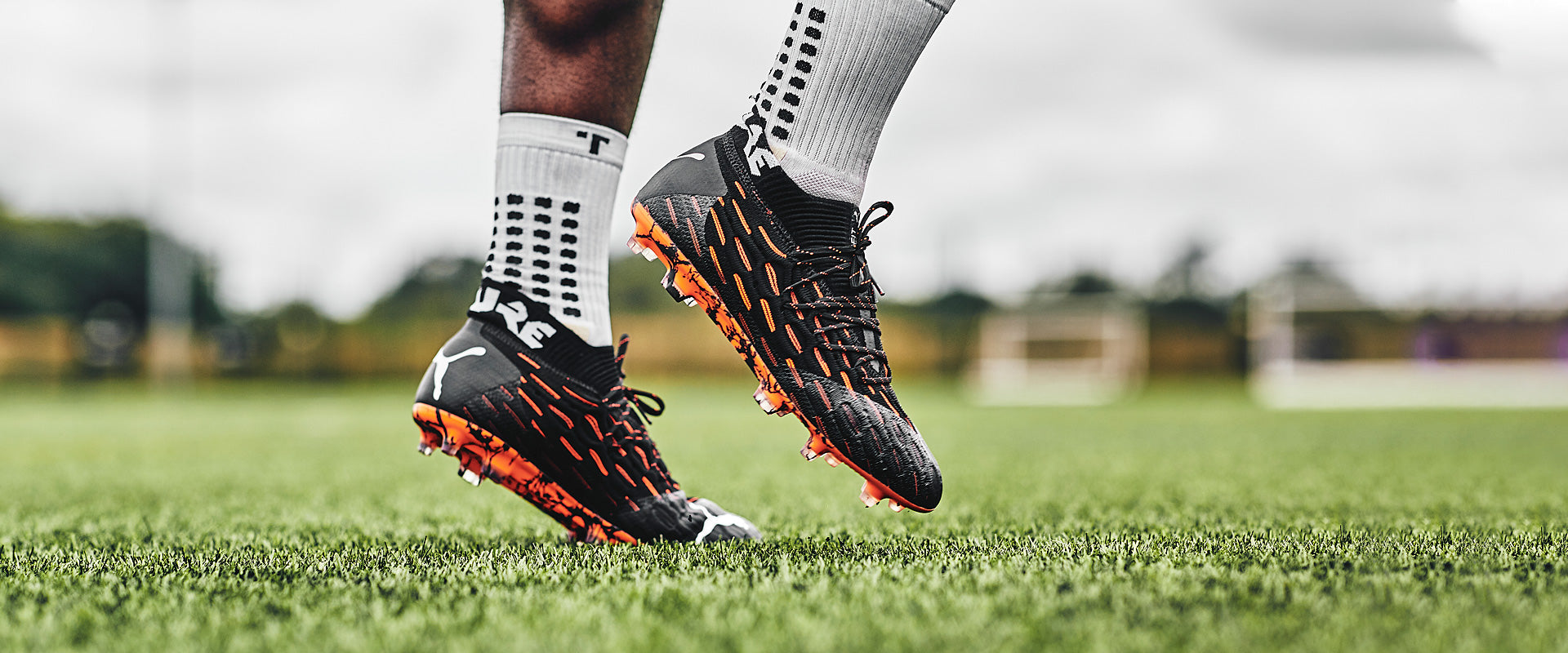 Puma Future 6.1 Netfit FG/AG - Black/White/Shocking Orange - Firm