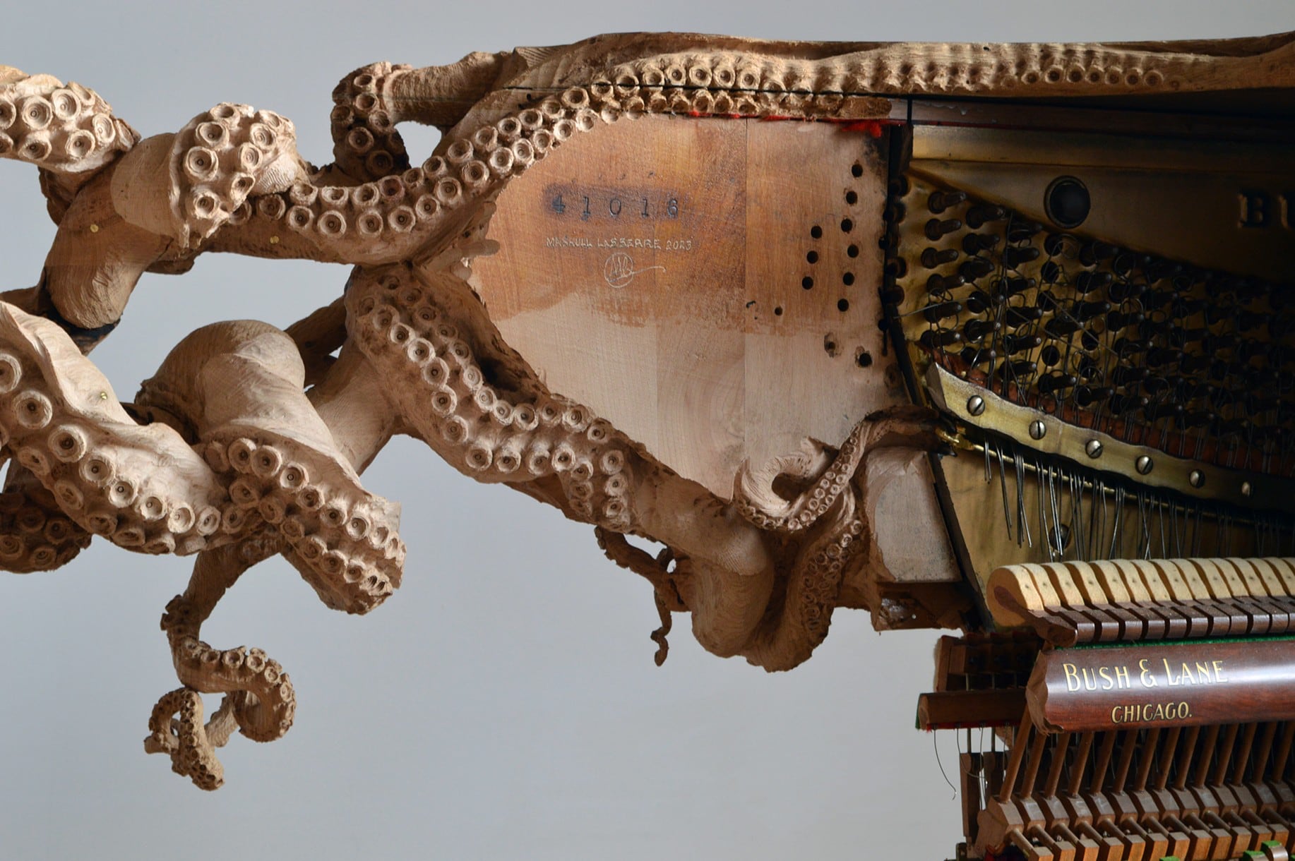 A Knotted Octopus Carved Directly into Two Pianos Entwines Maskull