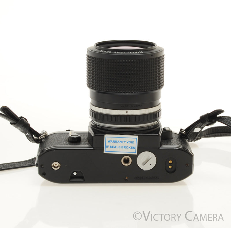 Nikon EM Black 35mm Film Camera with Nikon E Series 36-72mm Zoom Lens