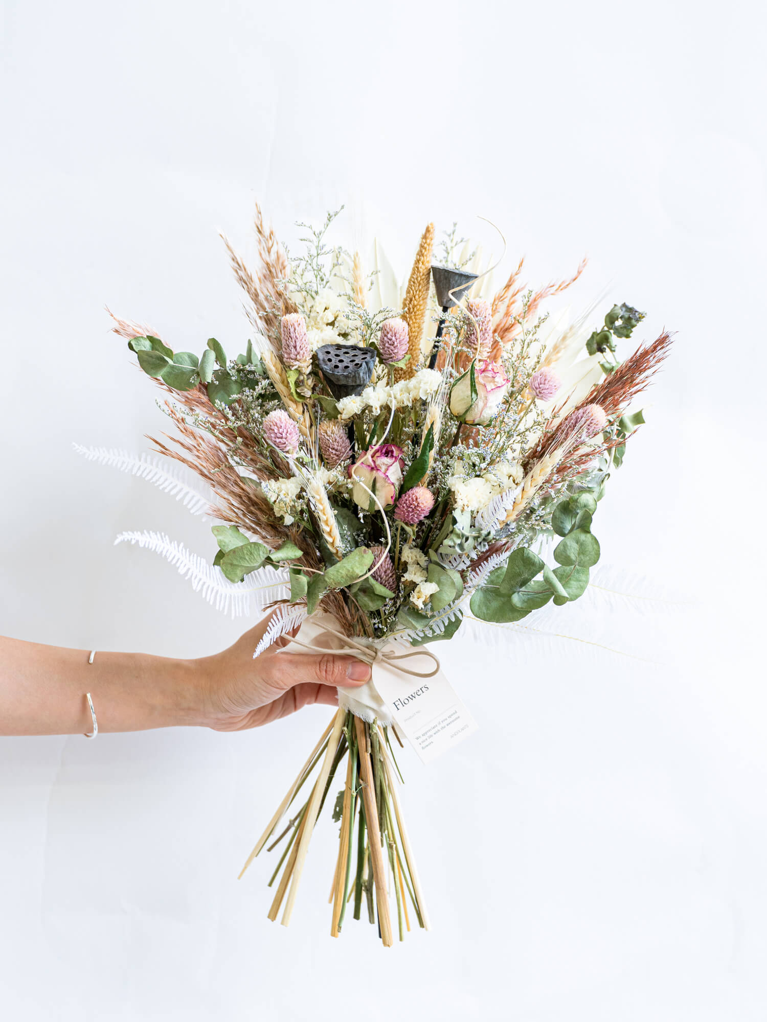 壁に掛ける】ドライフラワーのスワッグ - ピンク - | お花の通販AND