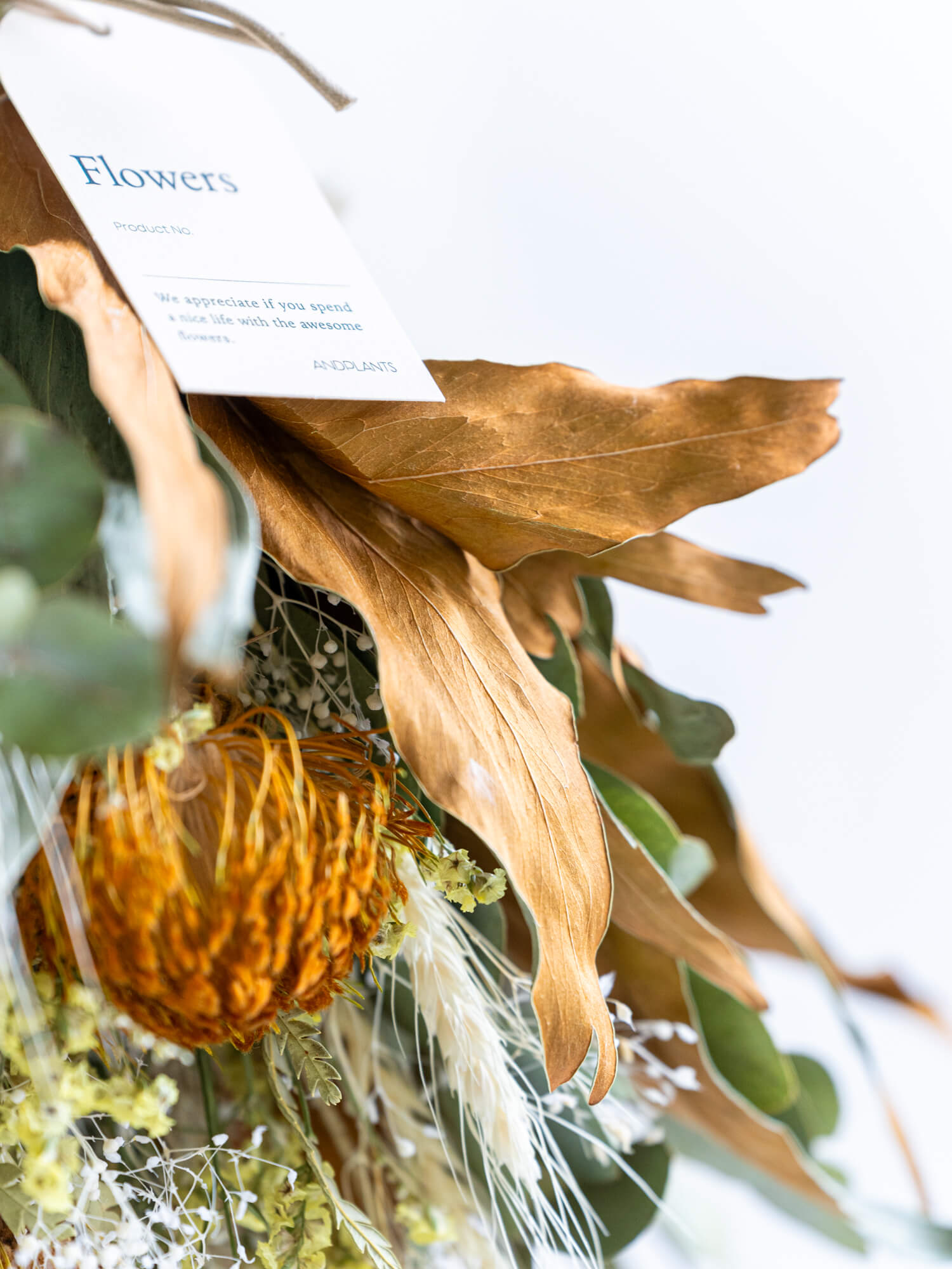 壁に掛ける】ドライフラワーのスワッグ - イエロー - | お花の通販AND