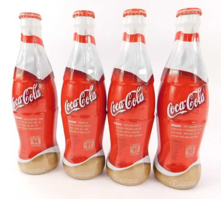 Four commemorative Coca-Cola bottles, for 2002 FIFA World Cup