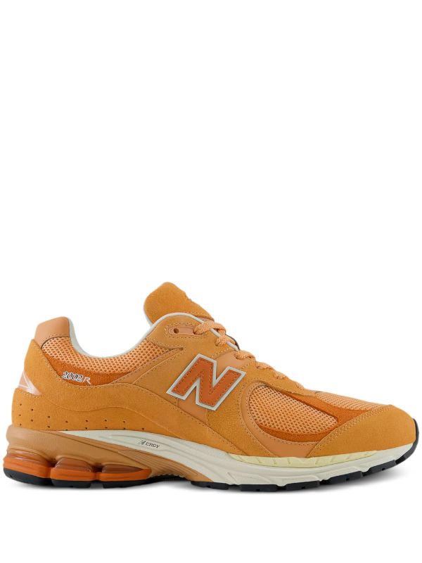 New Balance 2002R スニーカー | オレンジ | FARFETCH JP