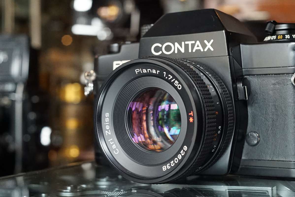 Contax RTS + Carl Zeiss Planar 1.7 / 50mm - Fotohandel Delfshaven