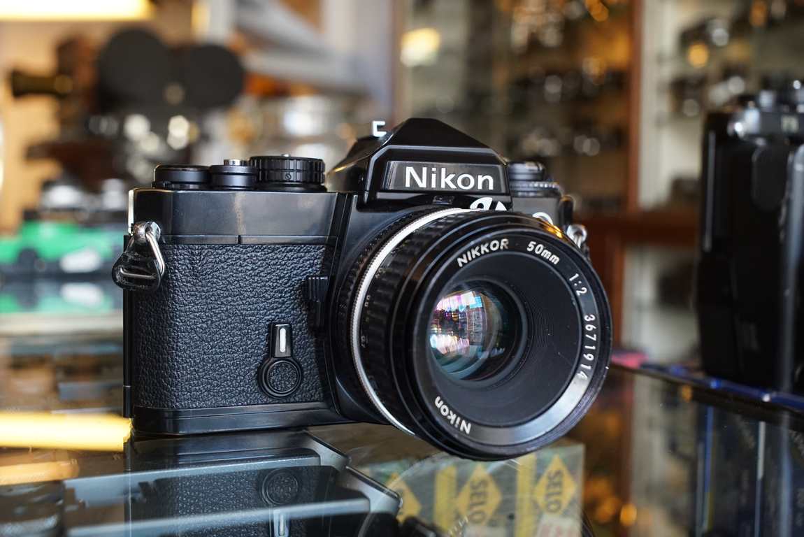 Nikon FE black + AI 50mm F/2 Nikkor lens, boxed - Fotohandel