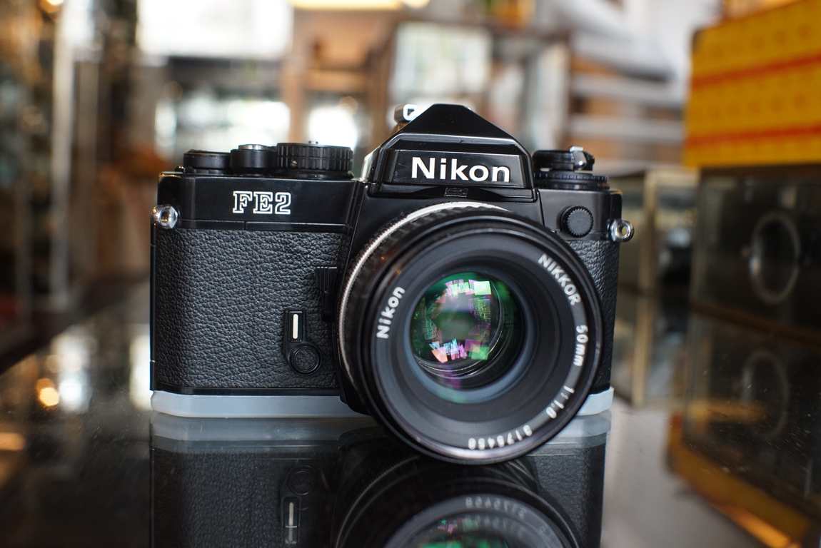 Nikon FE2 black kit + Nikkor 50mm F/1.8 AI-S lens - Fotohandel