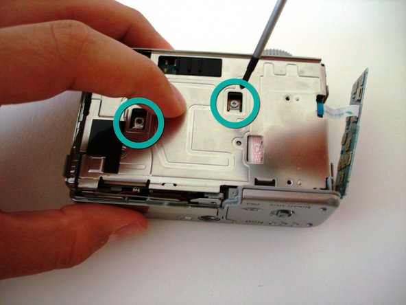 Sony Cyber-shot DSC-W5 battery compartment replacement - iFixit
