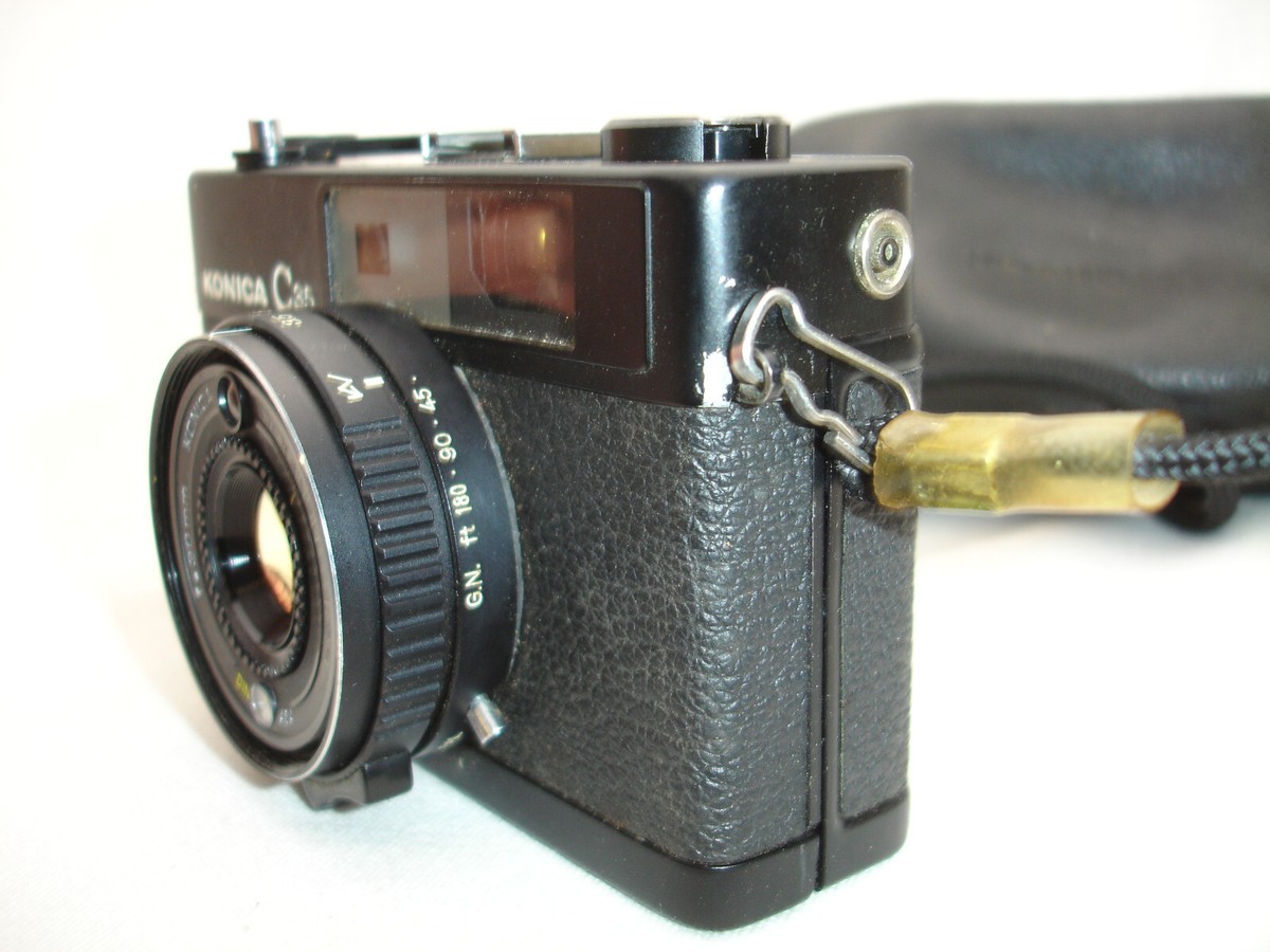 Konica C35 38mm f/2.8 Rangefinder 35mm Film Camera with strap, cap