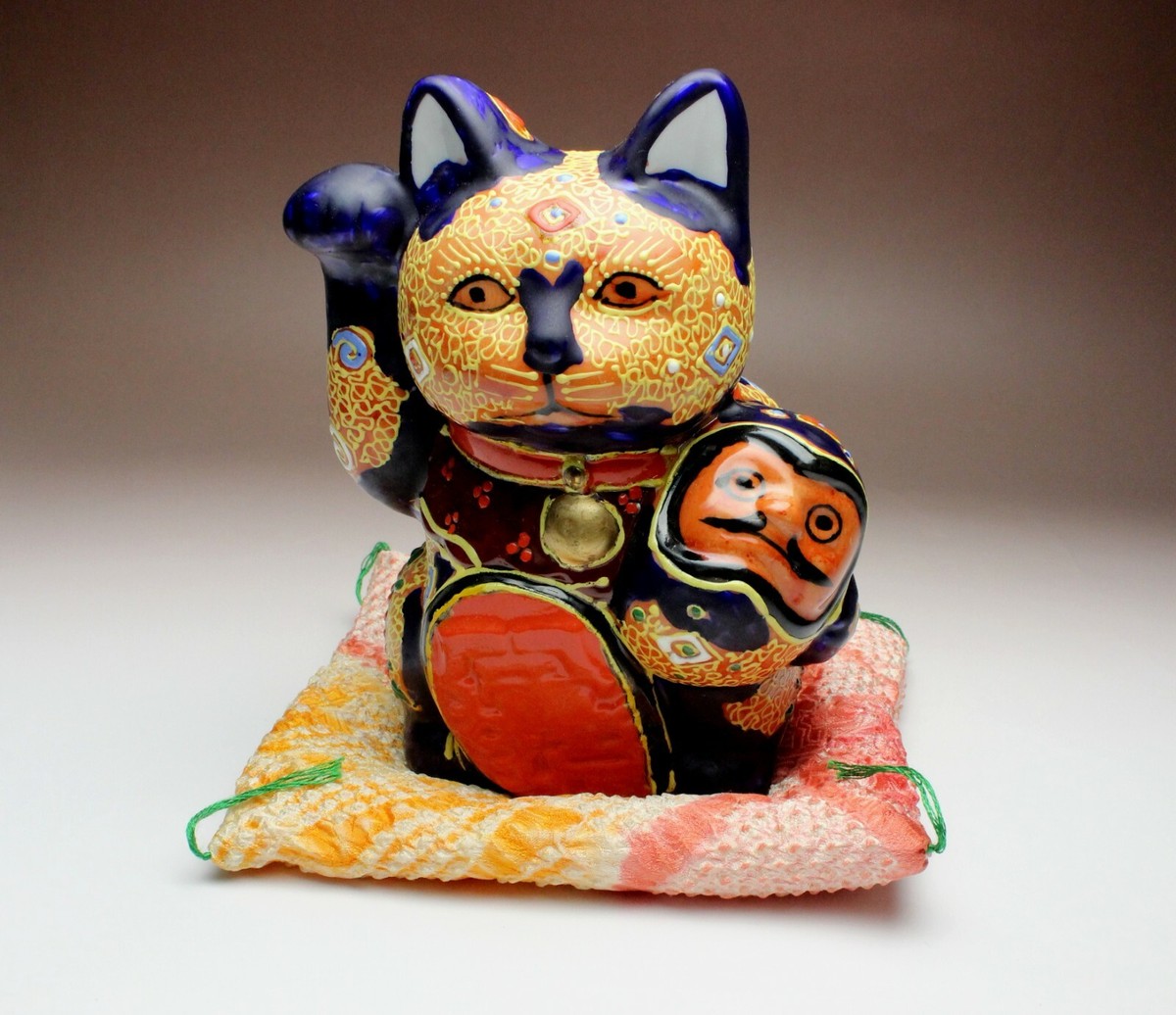 Raised Moriage Maneki Neko Holding Daruma Beaded Lucky Cat Tokkuri