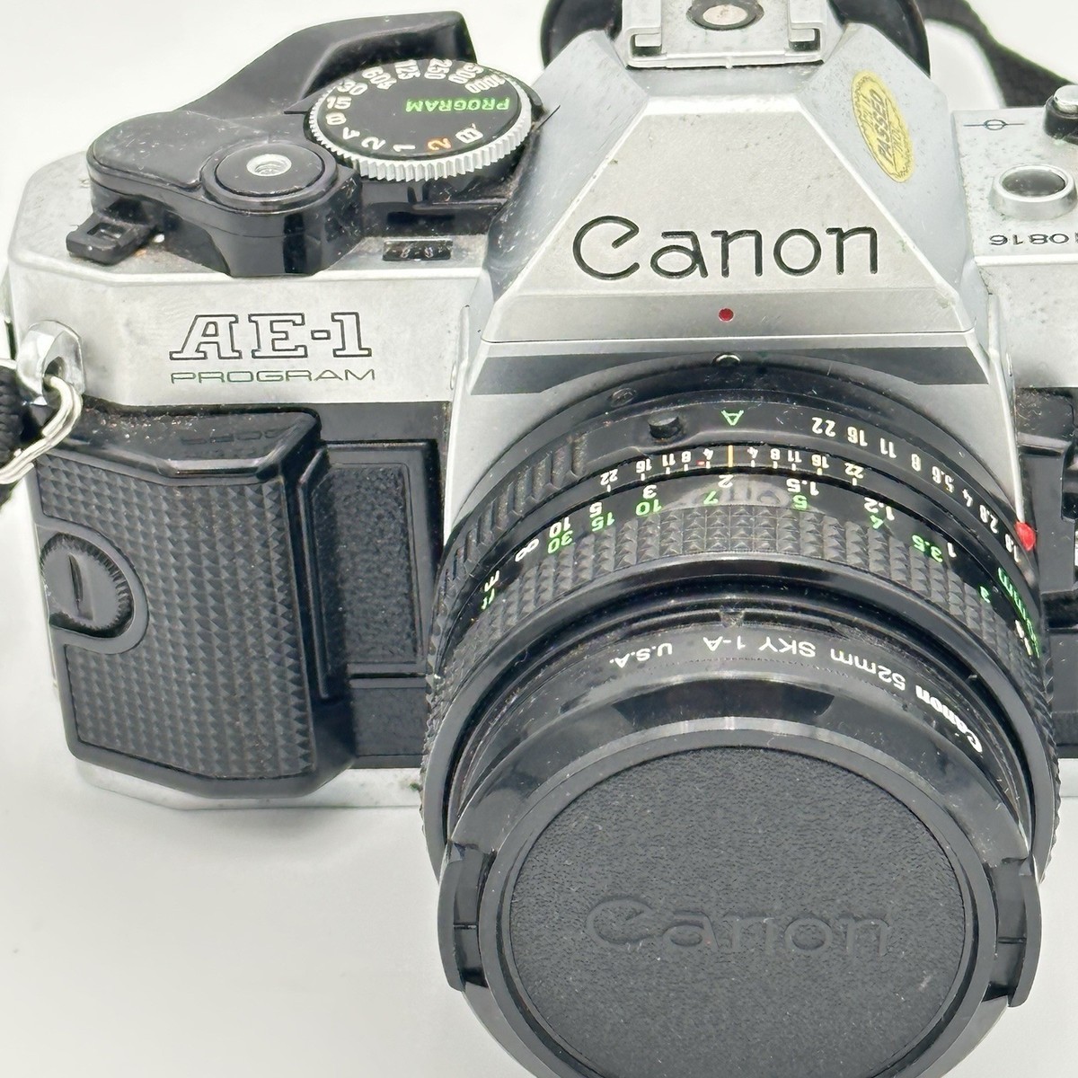 Canon AE-1 program Film Camera With 50mm Canon Lens Strap and Film