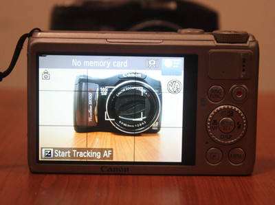 Canon PowerShot S100 12.1MP Digital Camera - Silver FOR PARTS AND