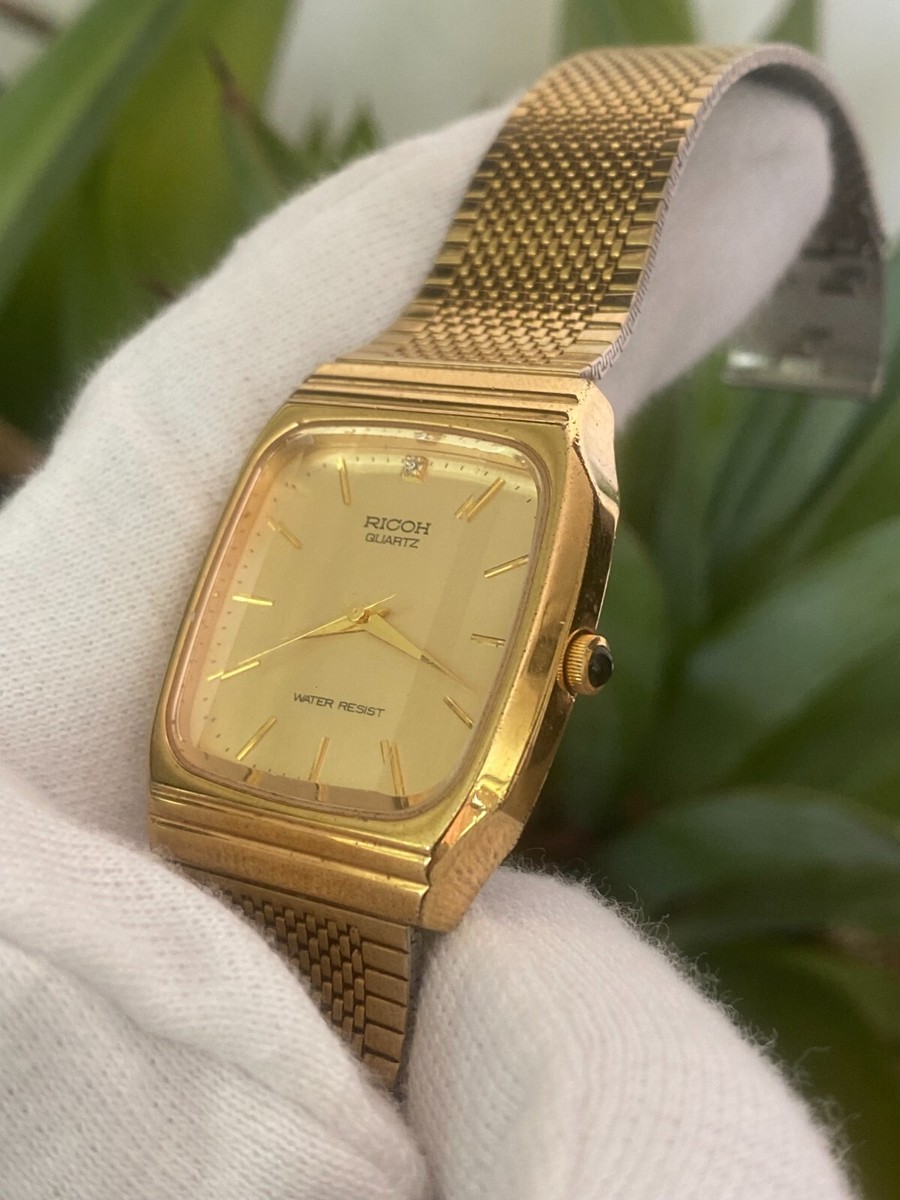 Ricoh Gold Dial Quartz Unisex Watch | eBay