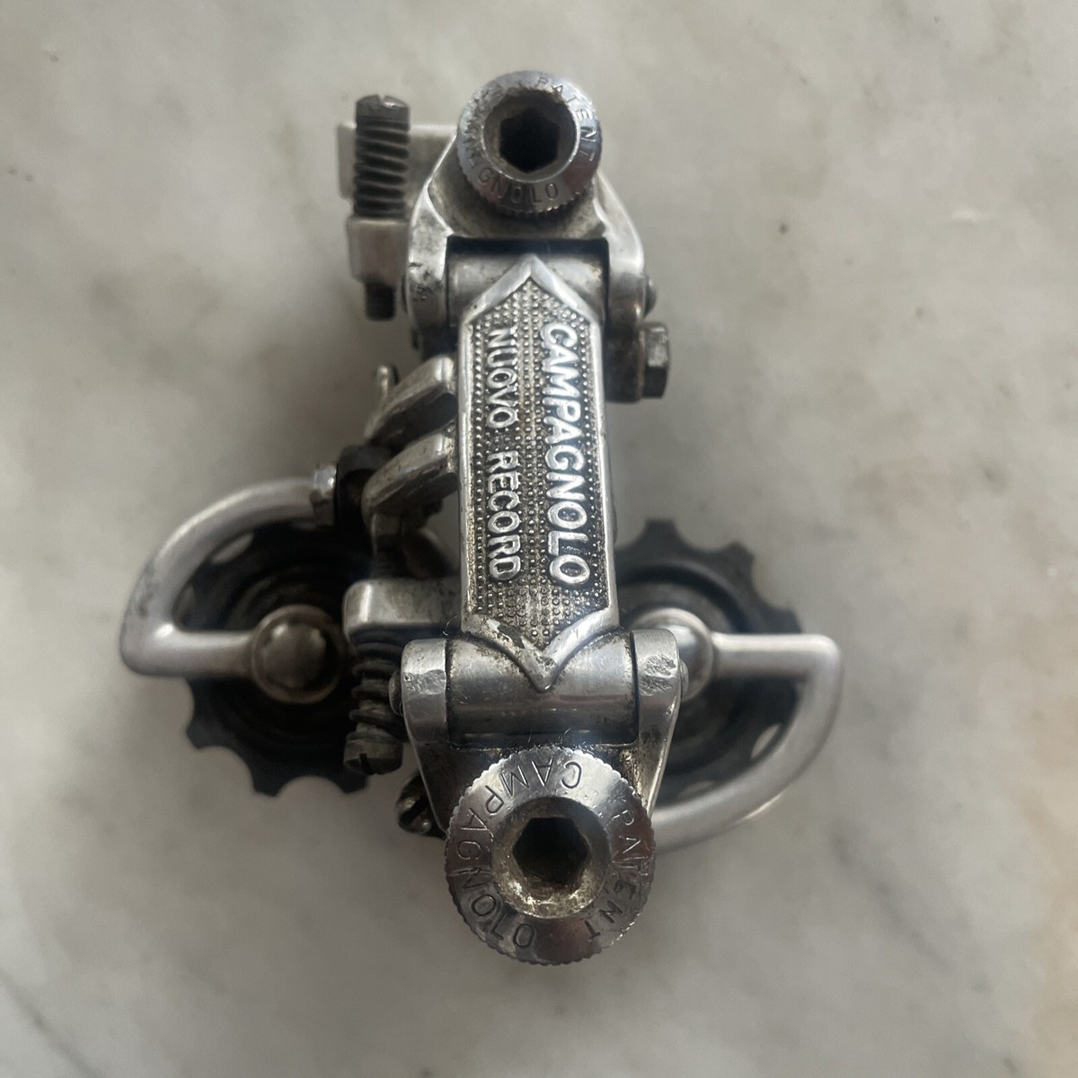 Vintage CAMPAGNOLO NUOVO RECORD Rear Derailleur Patent 73. (NJ) | eBay