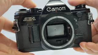 Canon AE-1 35mm SLR Camera Black with FD 50mm F/1.4 S.S.C. Lens