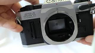 Canon AE-1 Program 35mm SLR Film Camera with New FD 50mm F/1.4 and