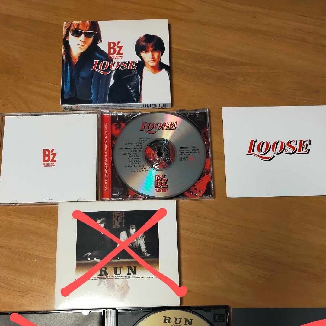 B'z - B'z CD まとめ売り アルバム7枚 シングル7枚の通販 by ミント's