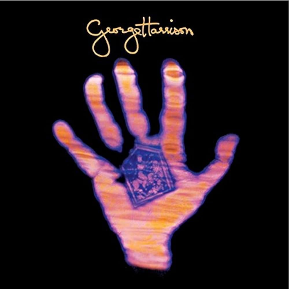 リヴィング・イン・ザ・マテリアル・ワールド - Amazon.com Music