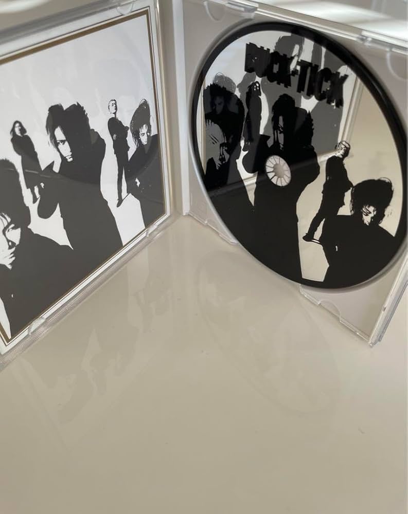 Amazon.co.jp: BUCK-TICK CD型ミラー バクチク 櫻井敦司 : ホビー
