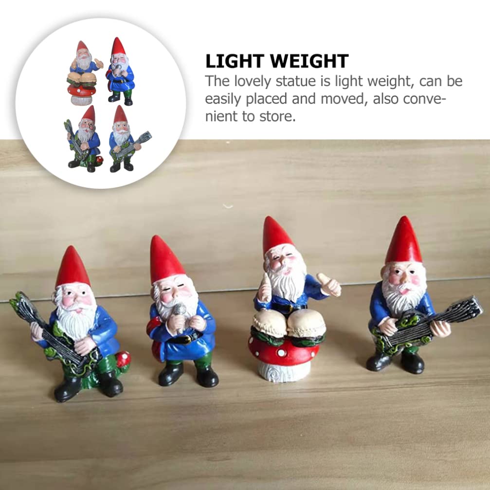 Amazon｜ノーム妖精樹脂像：幸せなノームのダンスのお祝いの音楽バンド