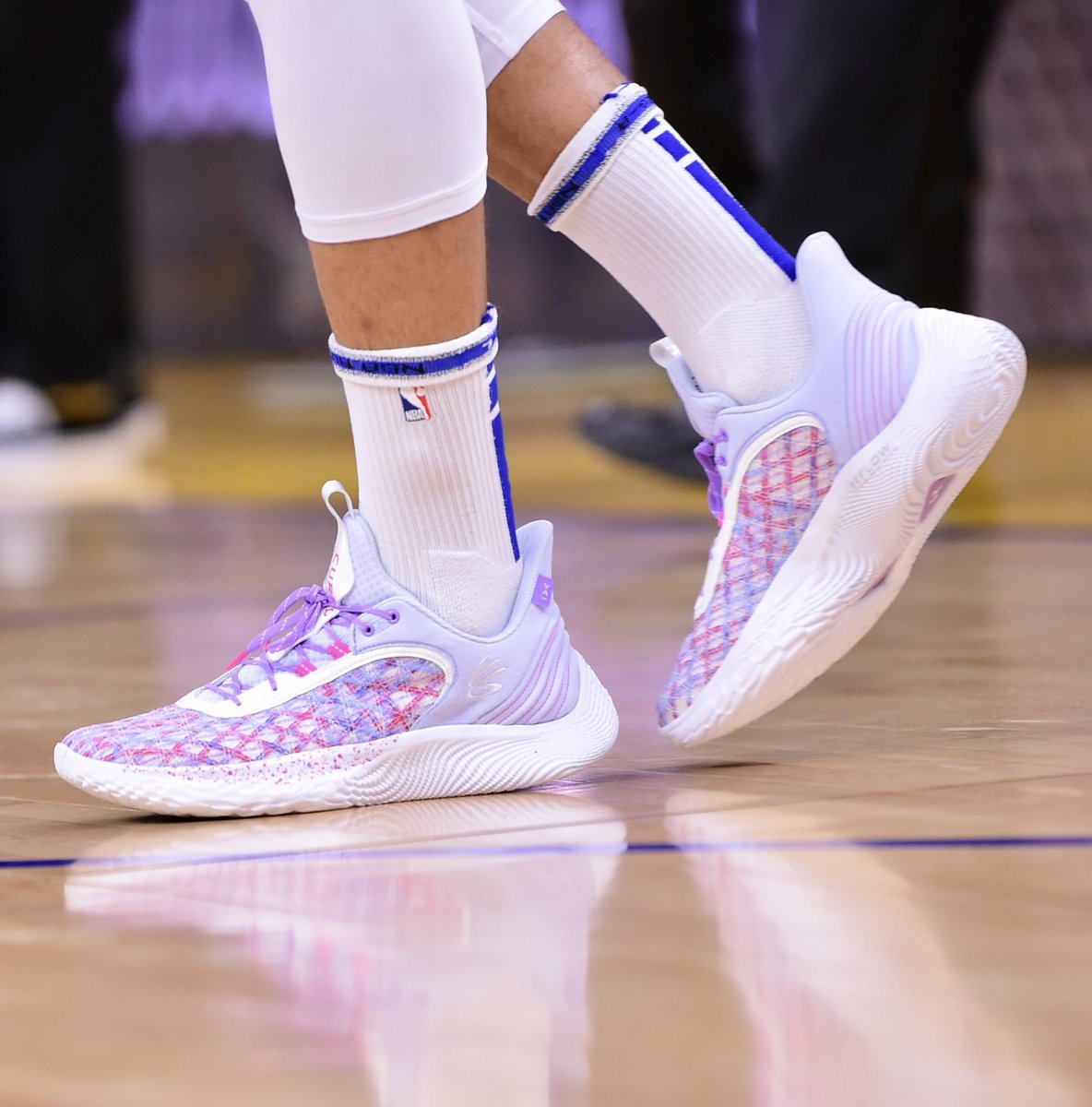 Stephen Curry is wearing the “International Women's Day” Curry 9s