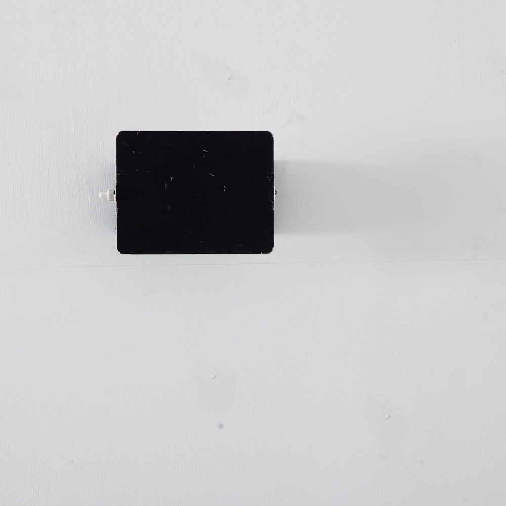 stoop | CP1 Wall Light in Black by Chalrotte Perriand