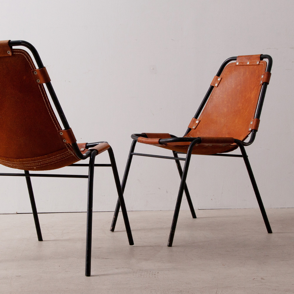 stoop | Les arcs Chair in Leather and Steel by Charlotte Perriand