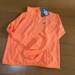 ニューバランス アウター オレンジ 未使用品 - メルカリ