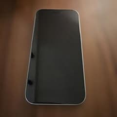 iPhone 15 256GB ホワイトSIMフリー｜背面割れ有（基盤一部露出