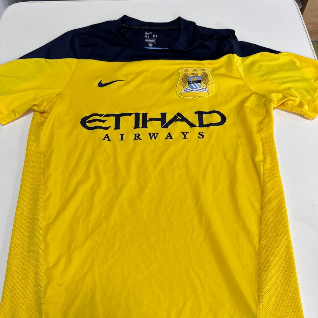 Nike サッカーシャツ マンチェスターシティ イエロー XL - メルカリ