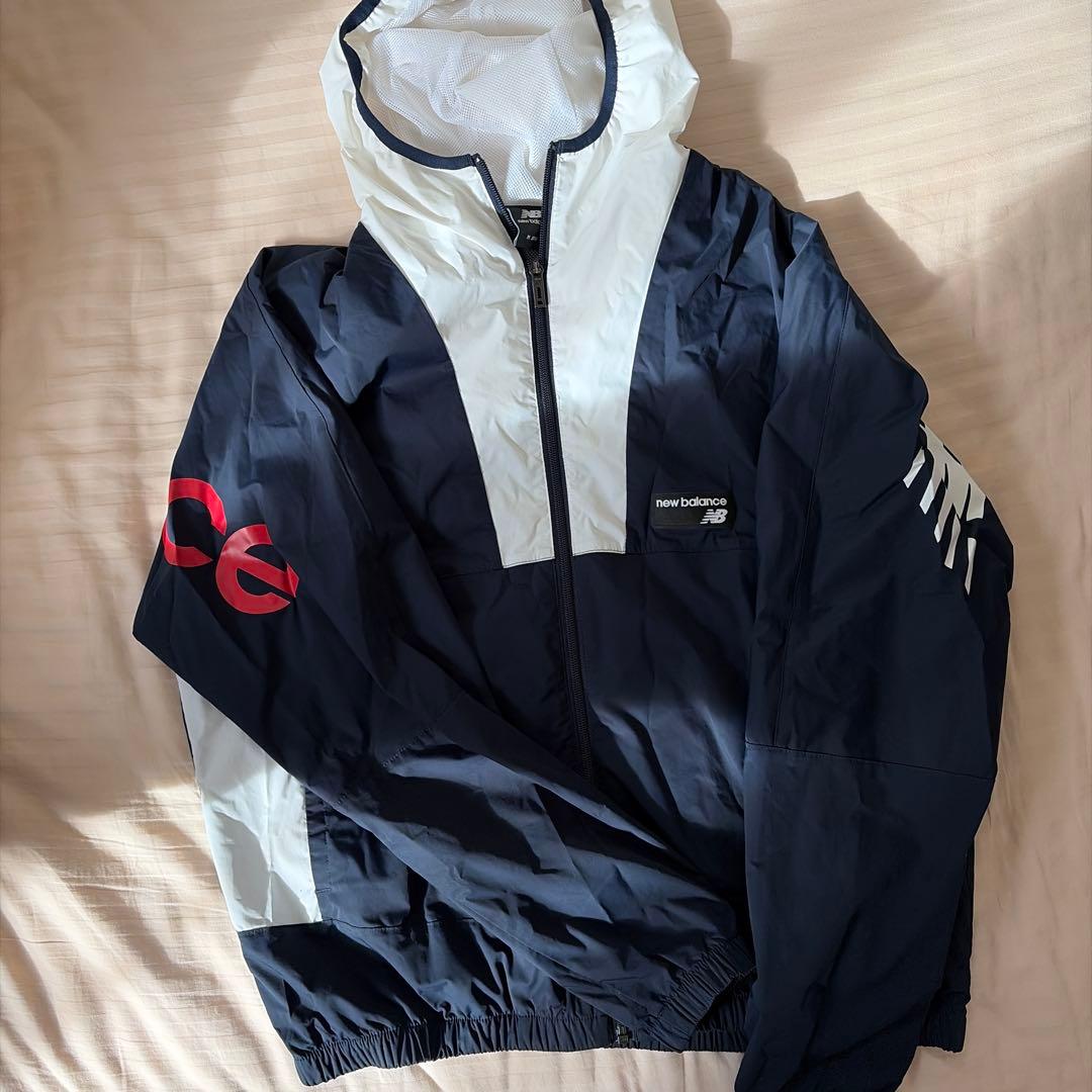 New Balance フード付きナイロンジャケット - メルカリ