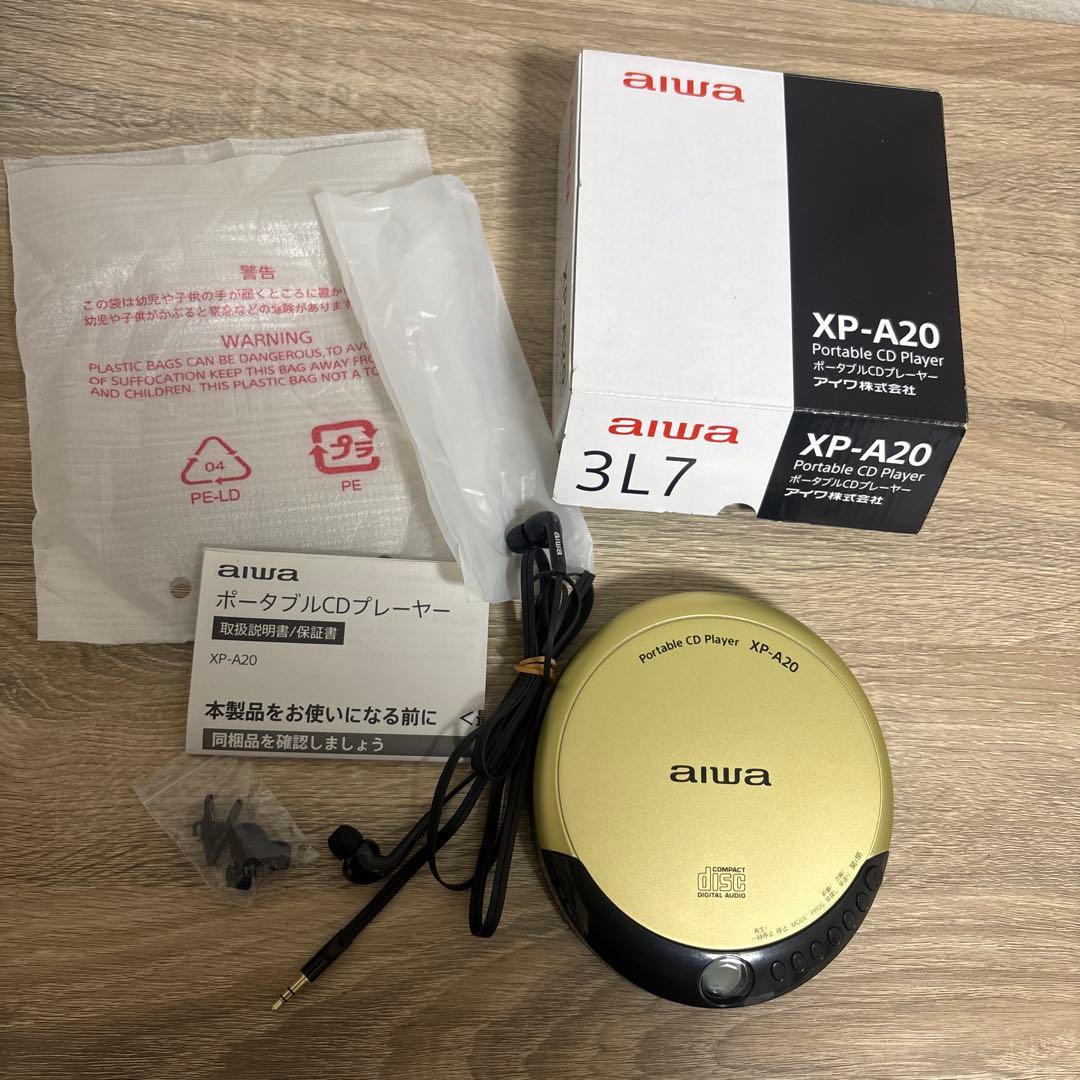 動作確認済み】aiwa ポータブルCDプレーヤー XP-A20 ゴールド - メルカリ