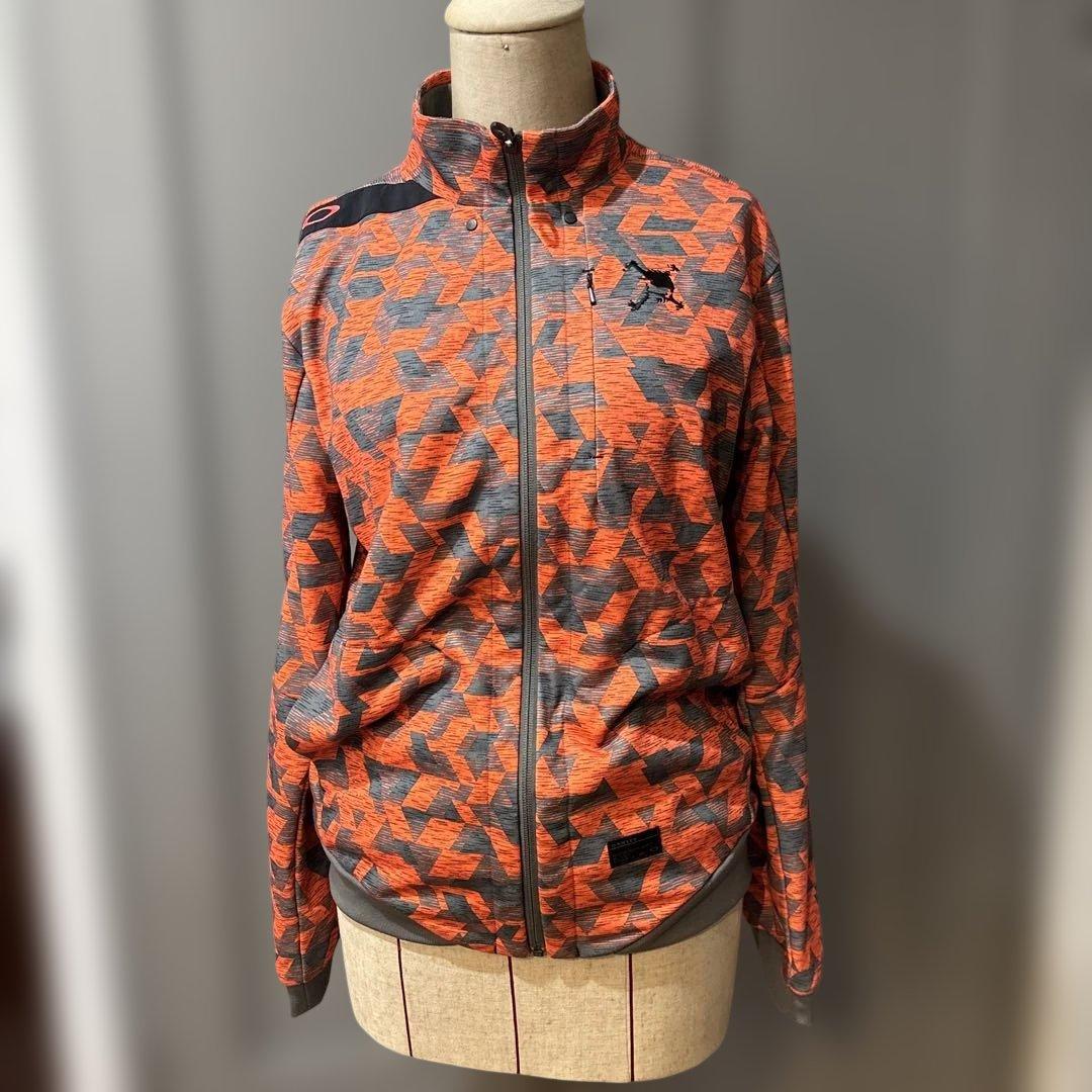 Oakley メンズ オレンジ グレー ジャケット - メルカリ
