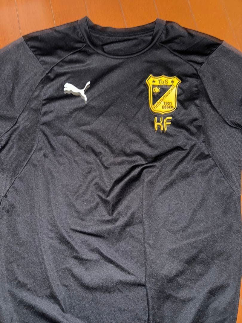 Puma 黒 長袖シャツ エンブレム付き PUMA（プーマ） メンズ サッカー/フットサル 長袖シャツ