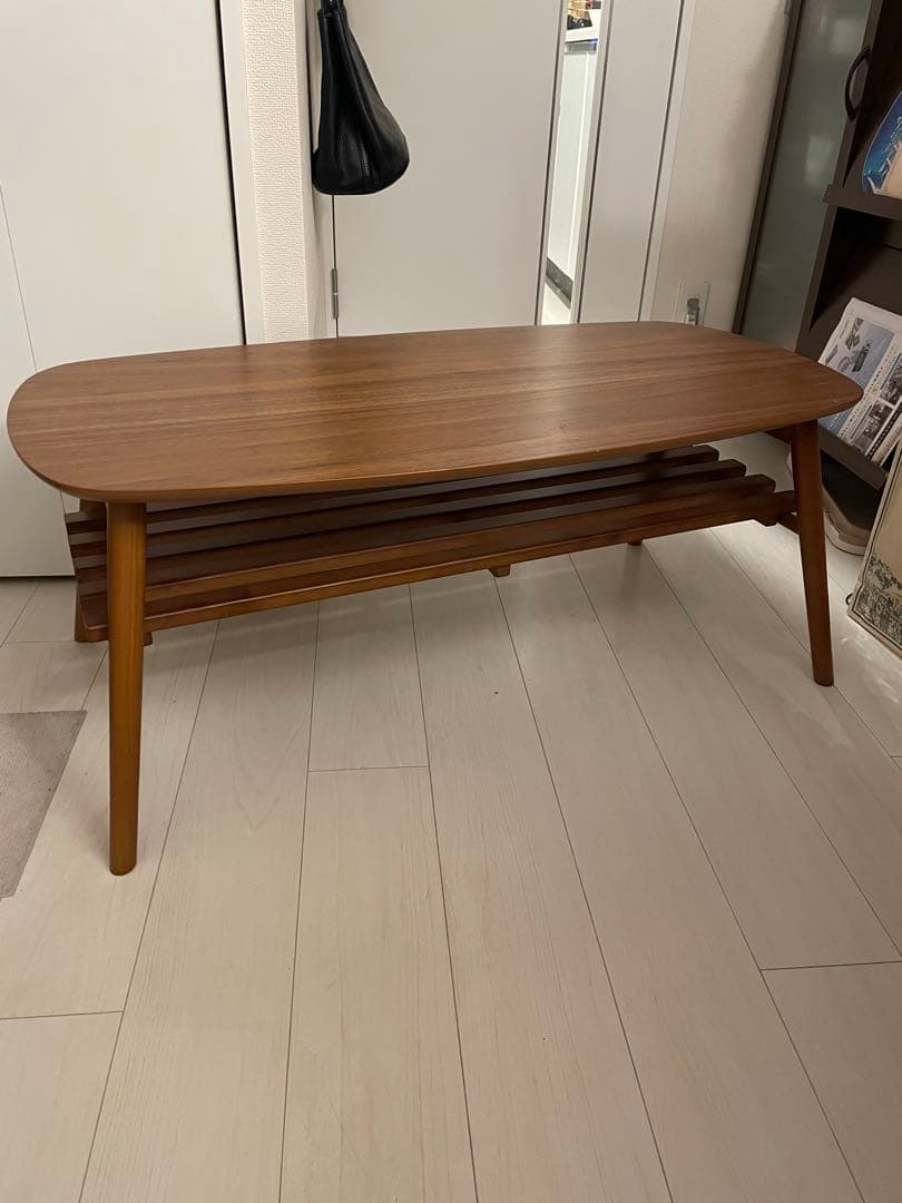 ブラウン楕円形センターテーブル 引き出し付き楕円形ウッドセンターテーブル | 収納力と美しさを両立