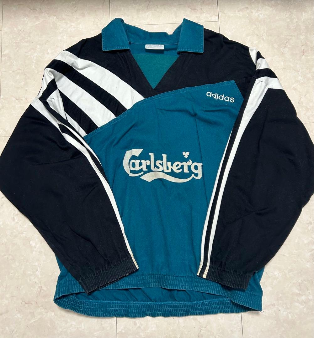 リヴァプール コットンプルオーバー adidas エンブレムなし アディダス adidas（アディダス） 25/26 リヴァプールFC オフィシャルグッズ